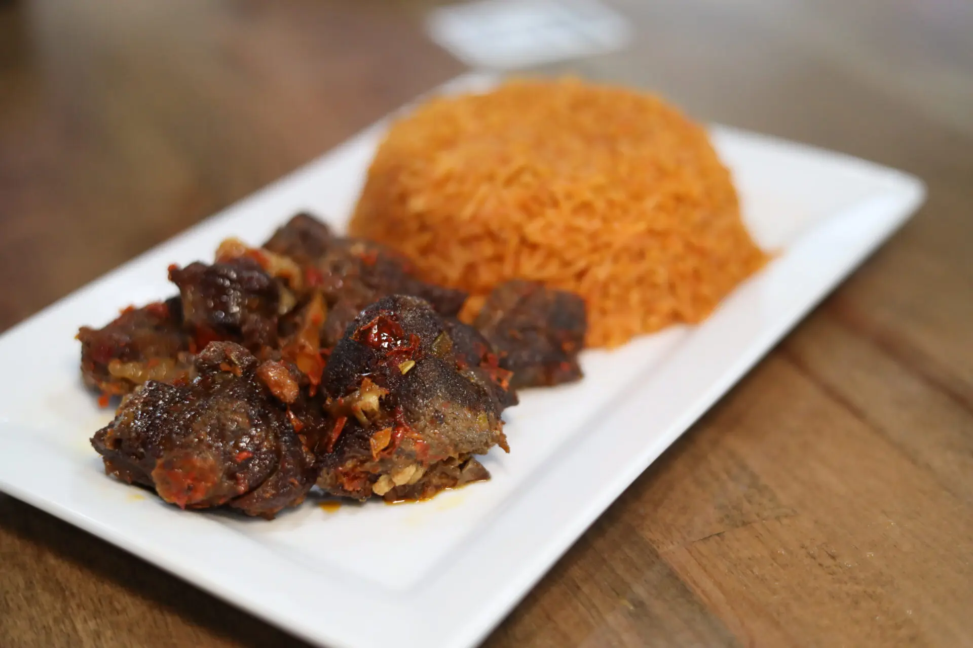 Jollof Rice + Peppered Goat Meat