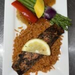jerk lamb chops and jollof rice