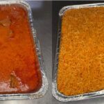 Two aluminum trays with tomato stew and rice
