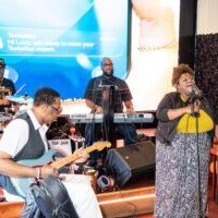 Live band performing in lounge with female vocalist